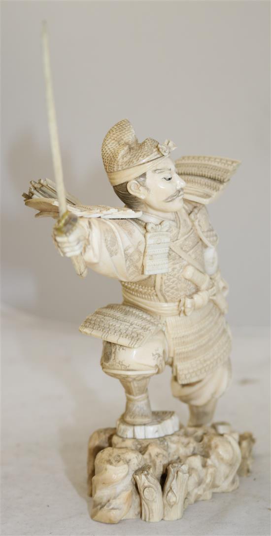 A Japanese sectional ivory figure of a Samurai warrior, early 20th century, height 20cm, slight losses